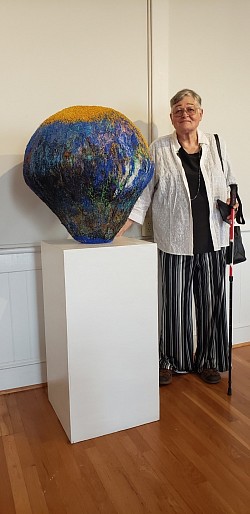 Shirley Cadmus with “Cosmic Bliss”, 3D piece in National Fiber Exhibit